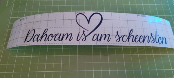 "Dahoam is am scheensten" - Schriftzug